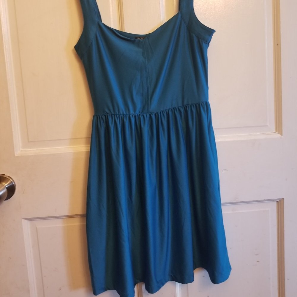 Teal dress with chunky straps and full skirt